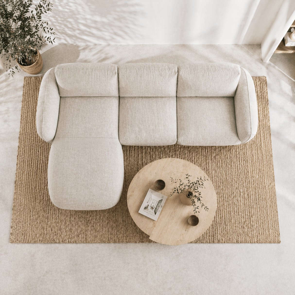 Canapé d'angle rond longue tissu texturé velours beige Dwayne - gauche