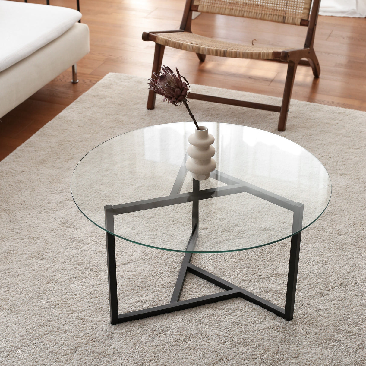 Table basse ronde en verre 75 cm - Cadre en métal noir 