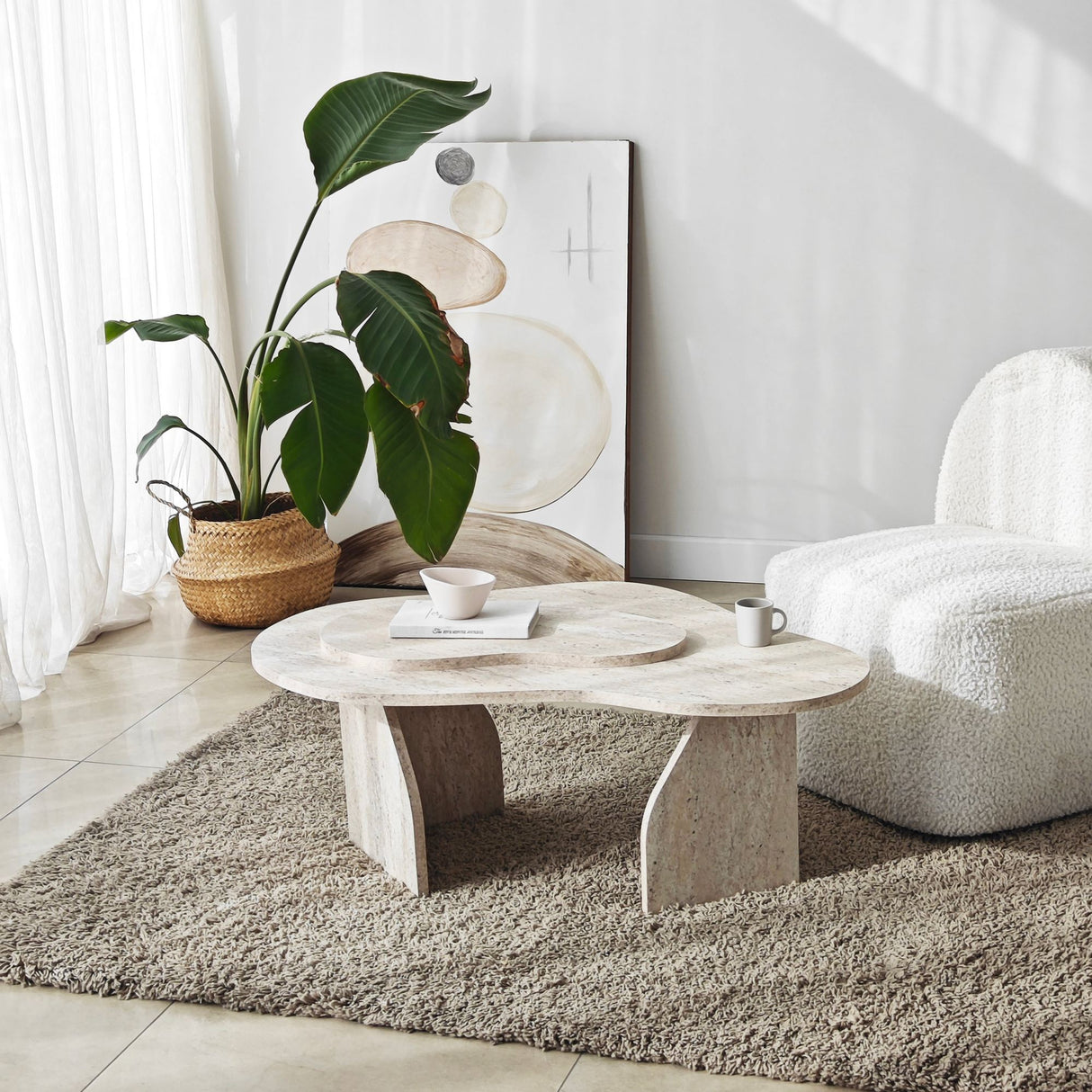 Table basse organique en travertin look marbre Melta - 105x65 cm 