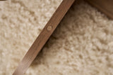 Table basse ronde en verre Aris - Piètement en mélamine noyer 