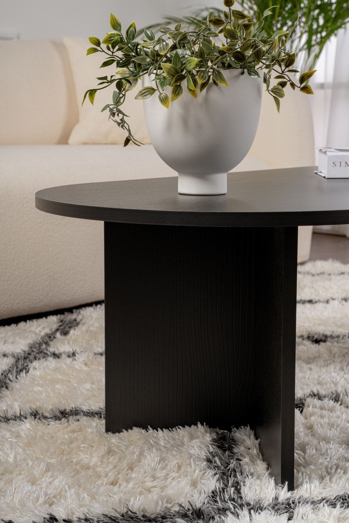 Table basse ovale aspect bois noir Sabla - 119x60 