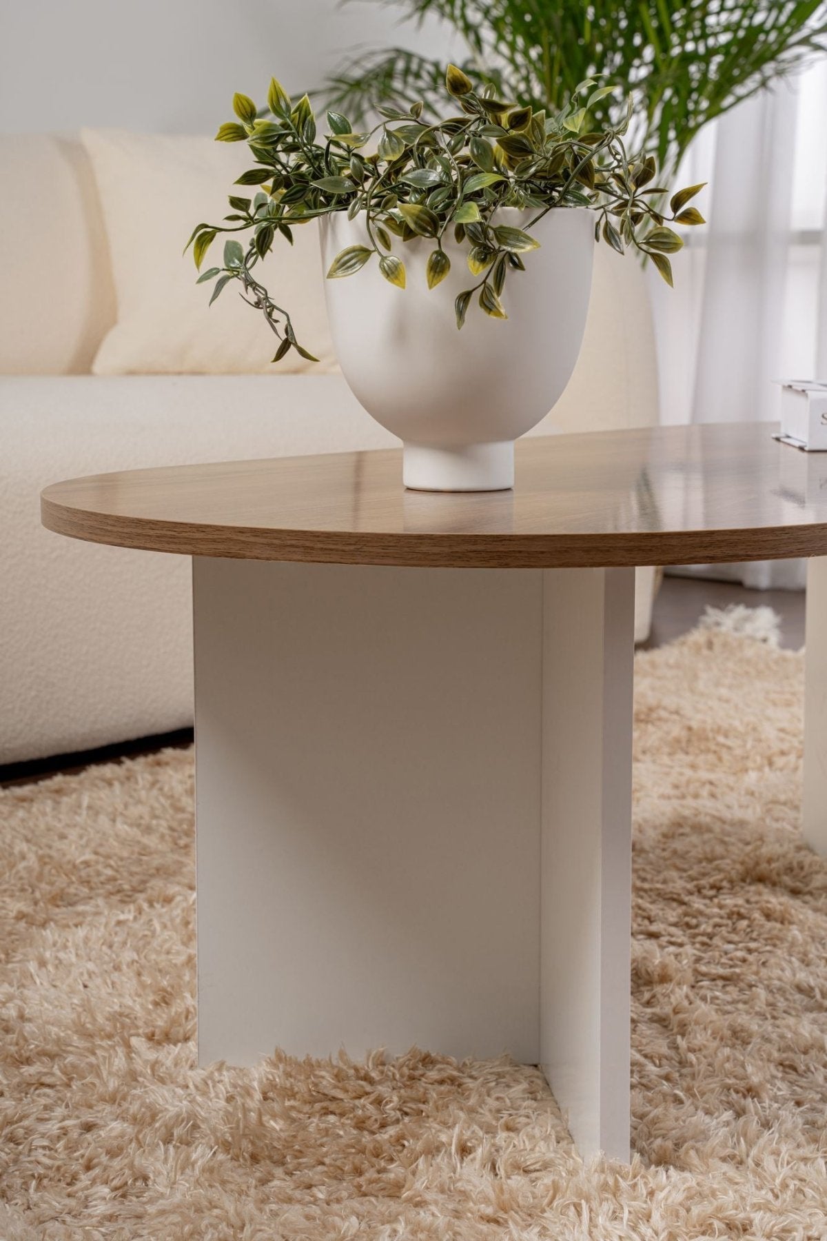 Table basse ovale aspect noyer - Pied blanc - Sabla - 119x60 
