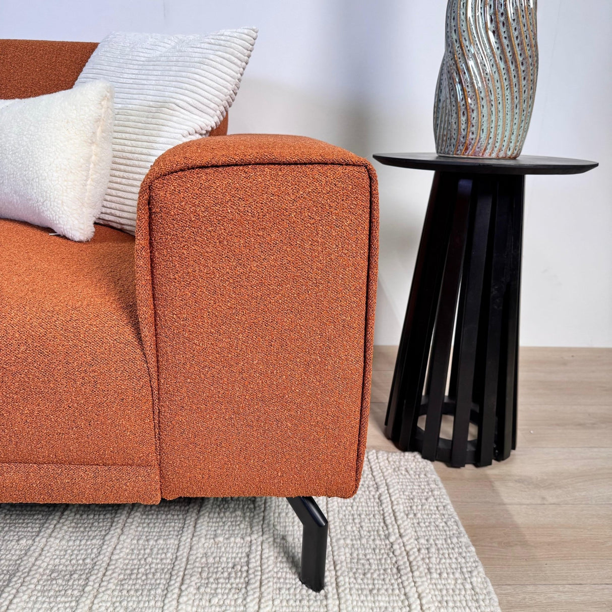 Hoekbank Maël bouclé stof in terracotta kleur - links
