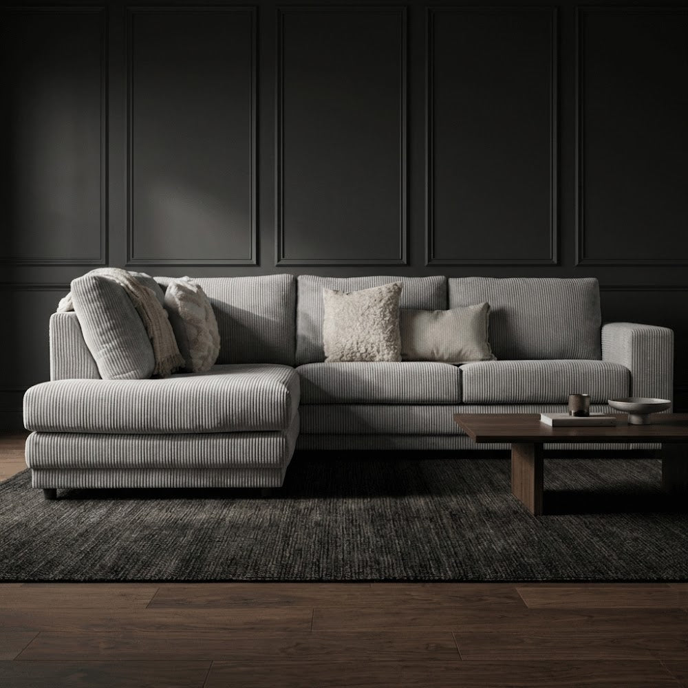 Hoekbank lichtgrijs ribstof plofbank Gabi - links