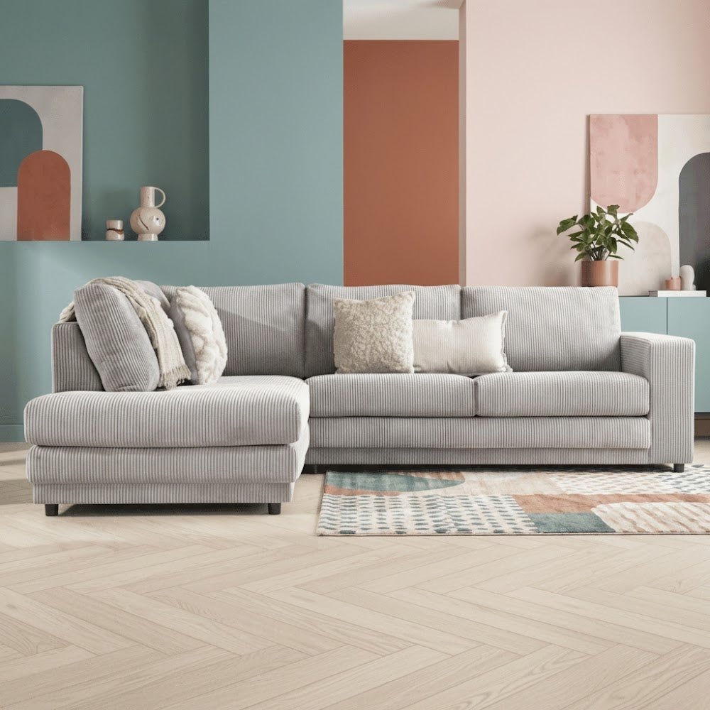 Hoekbank lichtgrijs ribstof plofbank Gabi - links